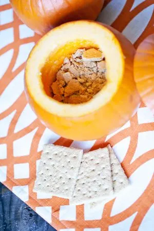 Pumpkin ice cream served in mini pumpkins | Sugar & Charm for The Sweetest Occasion