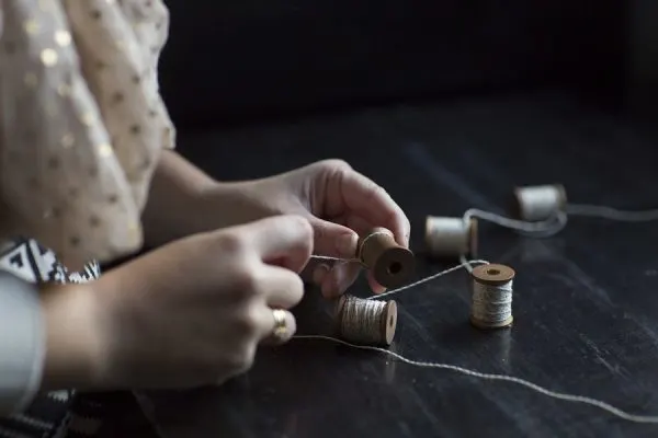 DIY Wooden Spool Garland