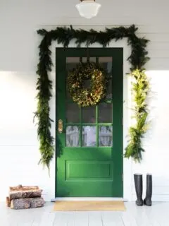 Green Door with Pine Garland and Wreath