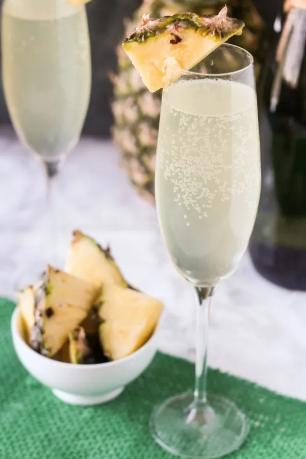 Pineapple Mimosa | Mimosa recipes + Easter brunch ideas from @cydconverse