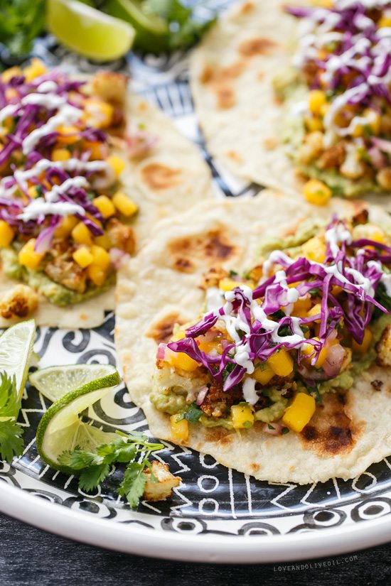 Crispy Cauliflower Tacos Recipe | Get your fix of taco recipes and the ultimate classic margarita recipe and loads of Cinco de Mayo party ideas at The Sweetest Occasion! Click to check it out or repin to save for later!