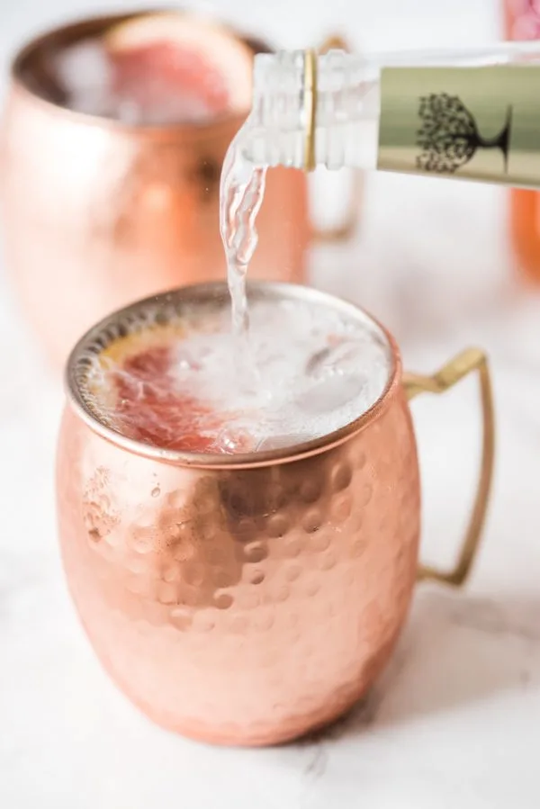 Grapefruit Moscow Mule Recipe | Cocktail recipes, party ideas and entertaining tips from @cydconverse - Repin to save or click through for the recipe!
