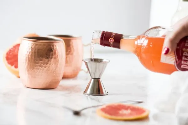 Grapefruit Moscow Mule Recipe | Cocktail recipes, party ideas and entertaining tips from @cydconverse - Repin to save or click through for the recipe!