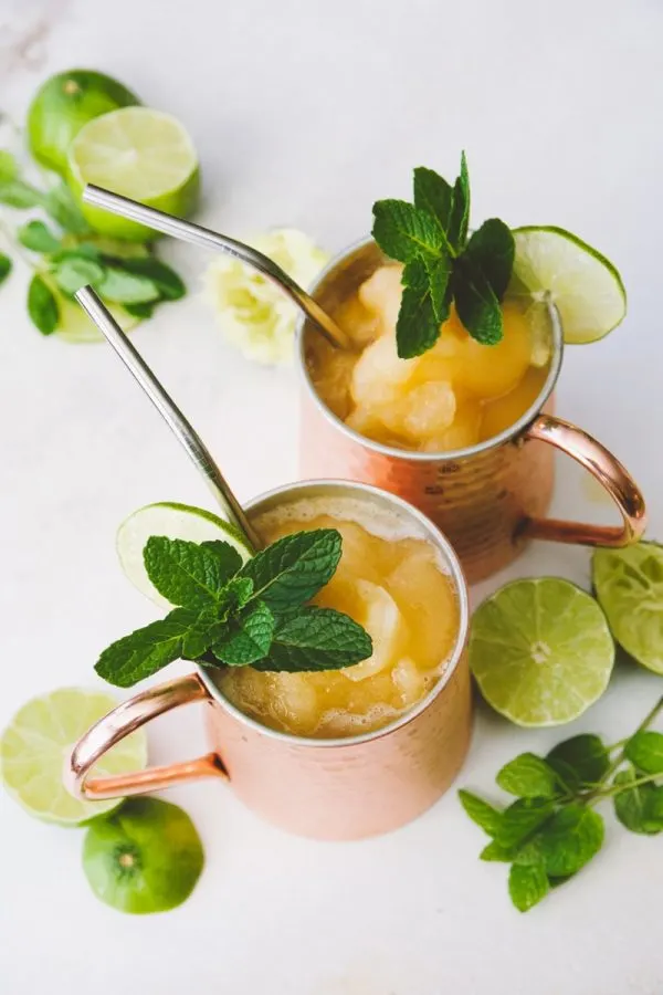 Frozen Peach Bourbon Mule Recipe | Cocktail recipes, summer entertaining ideas and party tips from @cydconverse
