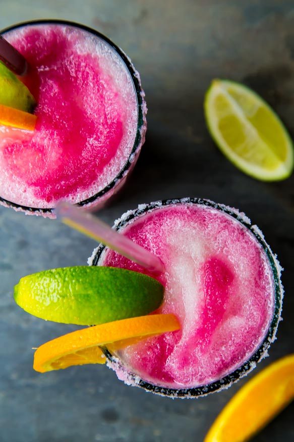 Sangria Swirl Frozen Margarita Recipe | Cocktail recipes, summer entertaining ideas and party tips from @cydconverse