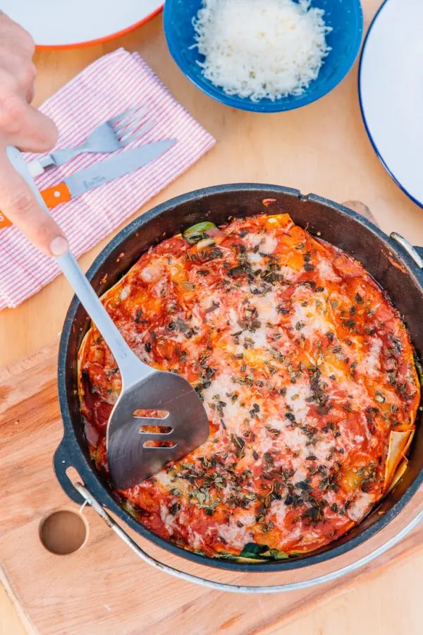 Campfire Dutch Oven Lasagna Recipe | 12 Delicious Camping Recipes from @cydconverse plus camping tips and a camping packing list!