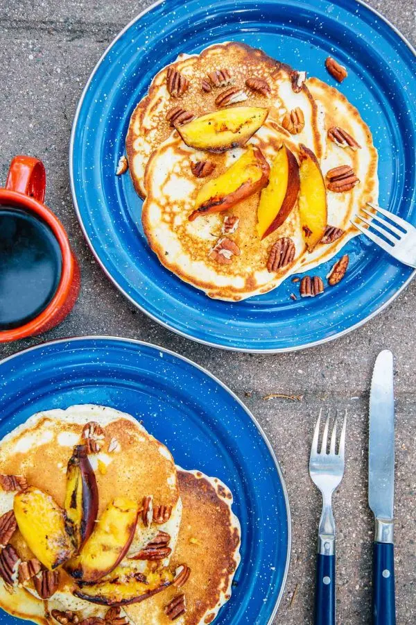 Campfire Pancakes with Grilled Peaches | 12 Delicious Camping Recipes from @cydconverse plus camping tips and a camping packing list!