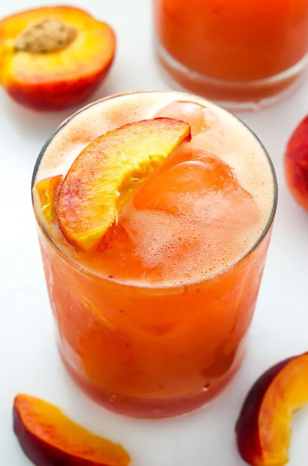 Fresh Peach Sangria | 15 Sangria Recipes for Late Summer and Fall | Cocktail recipes, entertaining tips and party ideas from @cydconverse