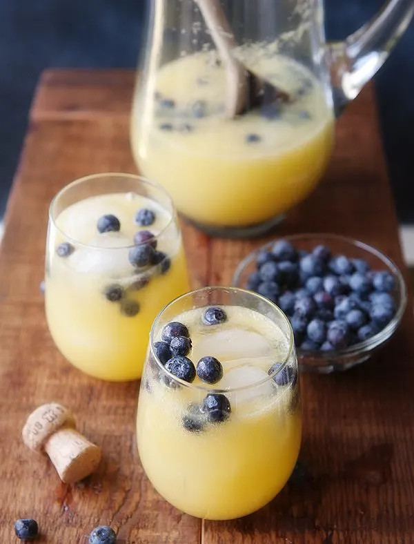 Mimosa Sangria | 15 Sangria Recipes for Late Summer and Fall | Cocktail recipes, entertaining tips and party ideas from @cydconverse