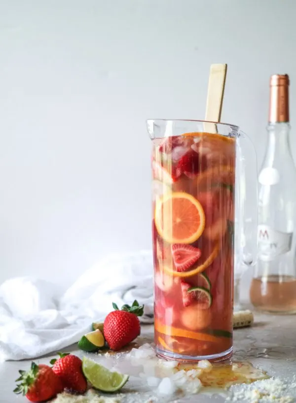 Rosé Sangria | 15 Sangria Recipes for Late Summer and Fall | Cocktail recipes, entertaining tips and party ideas from @cydconverse