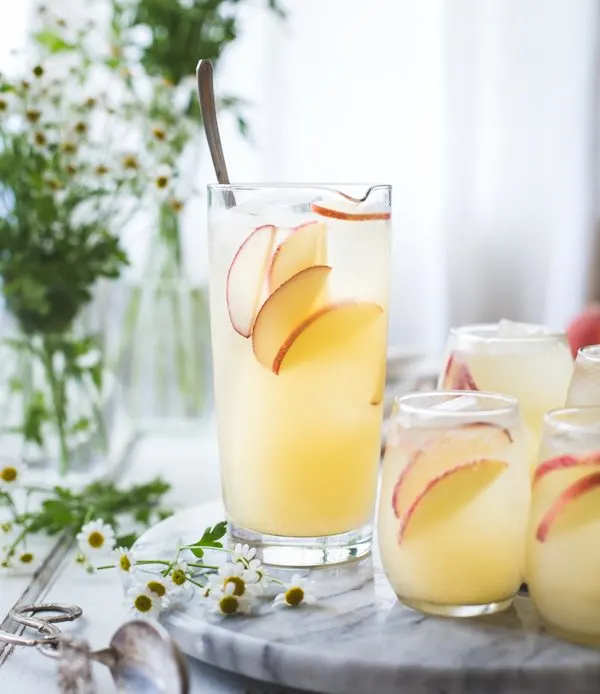 White Nectarine Sangria with Fresh Ginger | 15 Sangria Recipes for Late Summer and Fall | Cocktail recipes, entertaining tips and party ideas from @cydconverse