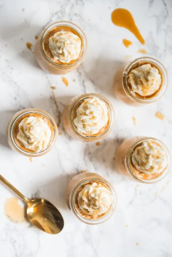 Salted Caramel Pumpkin Cheesecake Parfaits | Fall recipes, fall desserts, entertaining tips, party ideas, Thanksgiving dessert ideas and more from @cydconverse