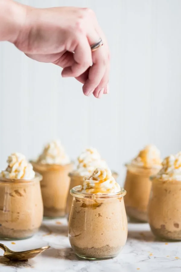 Salted Caramel Pumpkin Cheesecake Parfaits | Fall recipes, fall desserts, entertaining tips, party ideas, Thanksgiving dessert ideas and more from @cydconverse