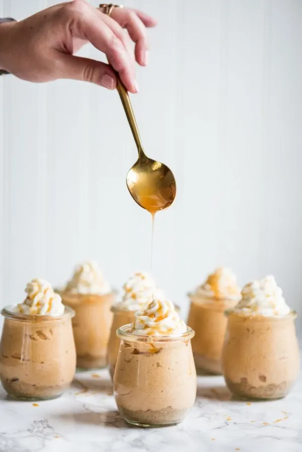 Salted Caramel Pumpkin Cheesecake Parfaits | Fall recipes, fall desserts, entertaining tips, party ideas, Thanksgiving dessert ideas and more from @cydconverse