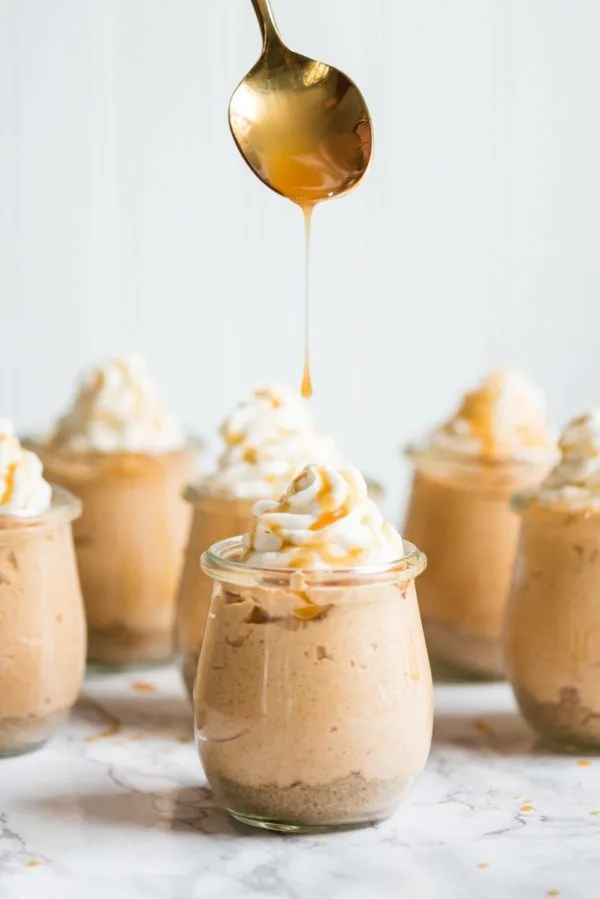 Salted Caramel Pumpkin Cheesecake Parfaits | Fall recipes, fall desserts, entertaining tips, party ideas, Thanksgiving dessert ideas and more from @cydconverse