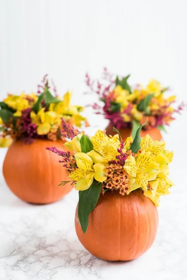 DIY Pumpkin Flower Arrangements | Thanksgiving ideas, Thanksgiving crafts, Thanksgiving table ideas and more DIY projects from @cydconverse