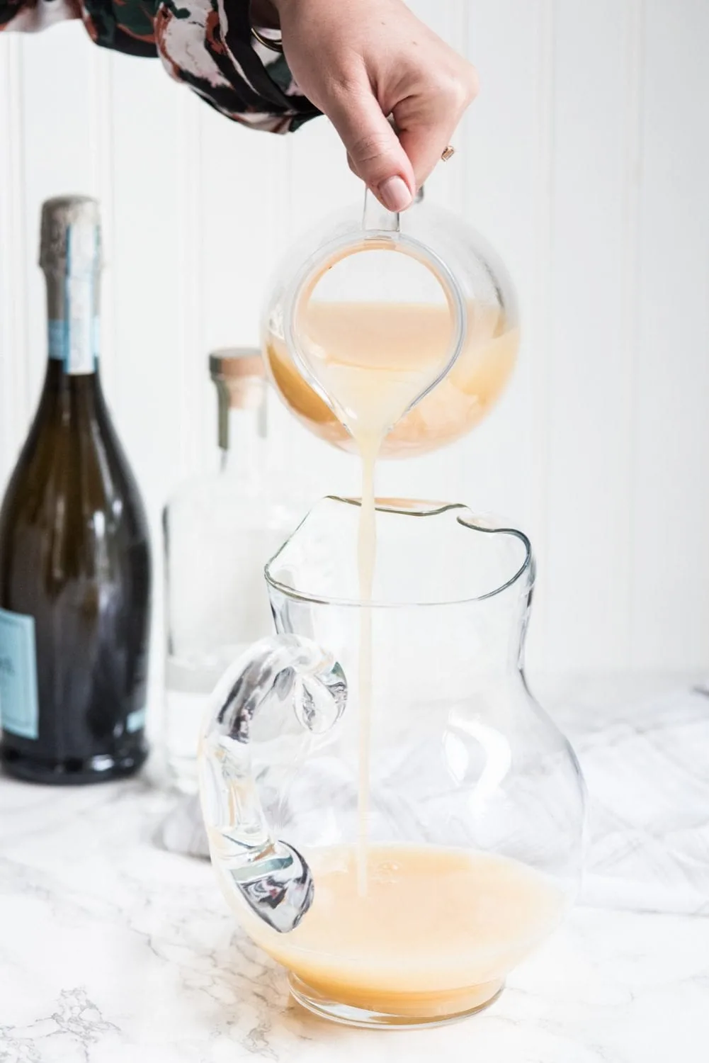 Fizzy Spiked Pear Punch Champagne Cocktail | Cocktail recipes, entertaining ideas, party recipes, party ideas and more from @cydconverse