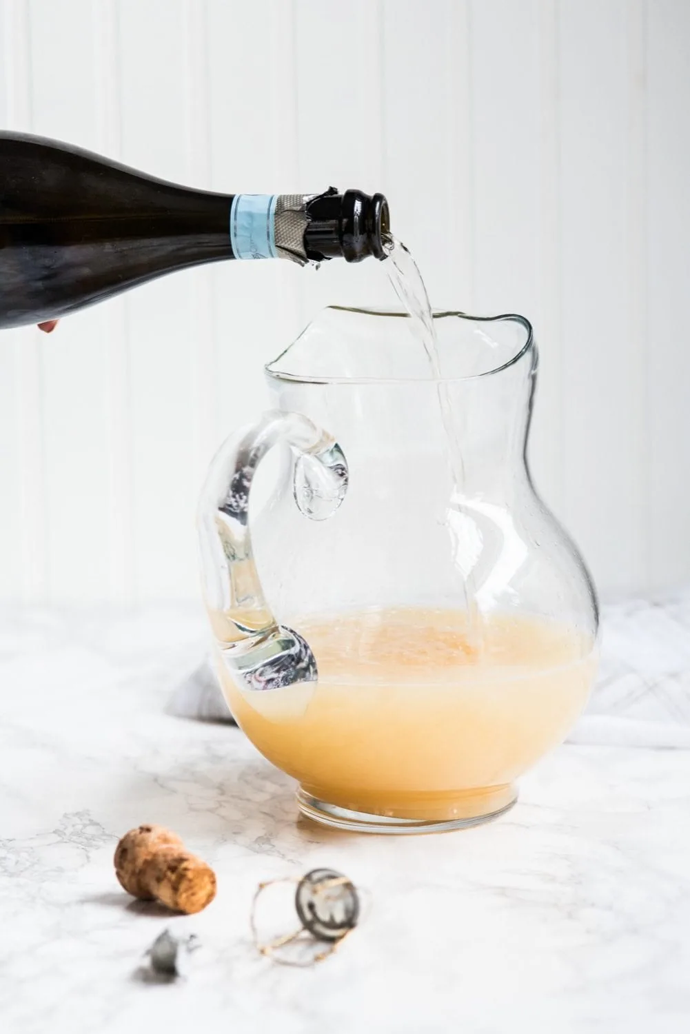 Fizzy Spiked Pear Punch Champagne Cocktail | Cocktail recipes, entertaining ideas, party recipes, party ideas and more from @cydconverse