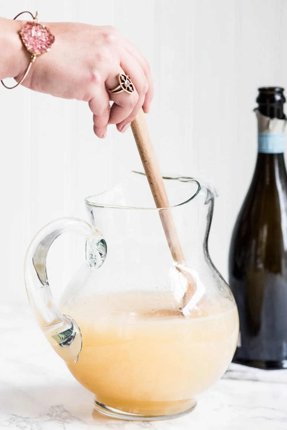 Fizzy Spiked Pear Punch Champagne Cocktail | Cocktail recipes, entertaining ideas, party recipes, party ideas and more from @cydconverse