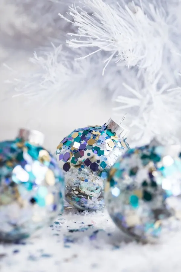 DIY Glitter Confetti Ornaments | Christmas craft ideas, homemade ornaments, Christmas recipes and more from @cydconverse