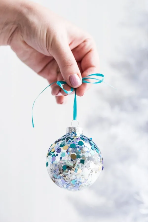 DIY Glitter Confetti Ornaments | Christmas craft ideas, homemade ornaments, Christmas recipes and more from @cydconverse