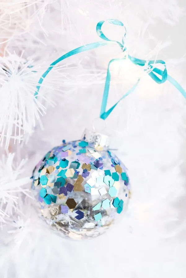 DIY Glitter Confetti Ornaments | Christmas craft ideas, homemade ornaments, Christmas recipes and more from @cydconverse