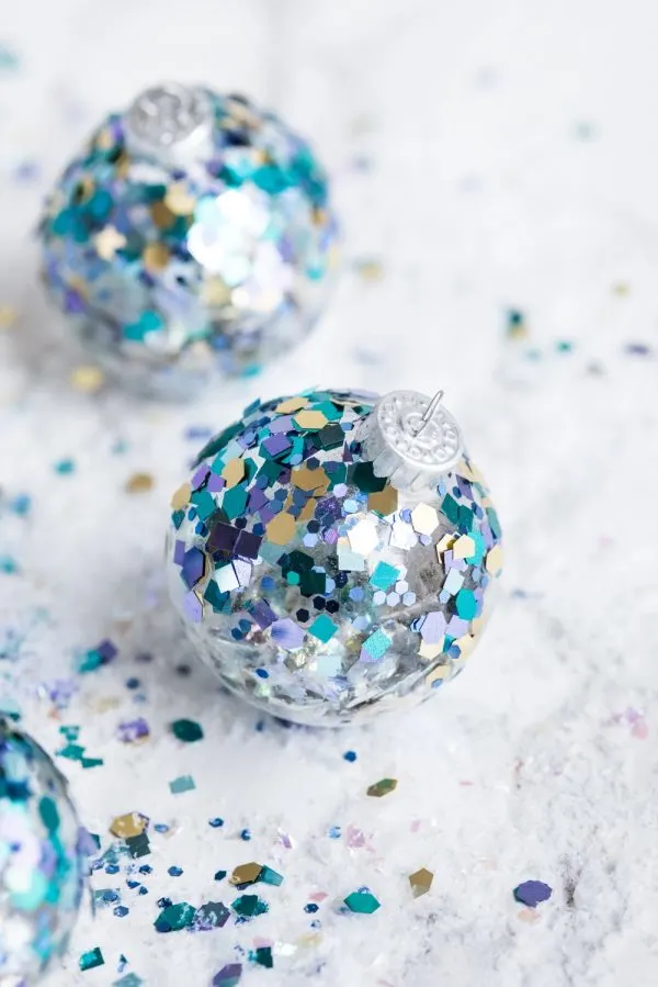 DIY Glitter Confetti Ornaments | Christmas craft ideas, homemade ornaments, Christmas recipes and more from @cydconverse