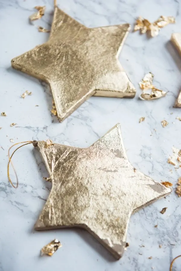 DIY Gold Leaf Star Ornaments | Homemade ornaments, homemade Christmas gifts, Christmas decor ideas and more from @cydconverse