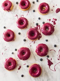 Vanilla Bean Cake Donuts with Blueberry Glaze | Baked donut recipes, party ideas and more from @cydconverse