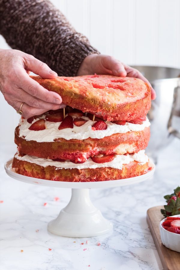 Strawberry Poke Cake with Berries + Cream | Birthday cake recipes, poke cake recipes, party appetizers, entertaining tips, birthday party ideas and more from @cydconverse