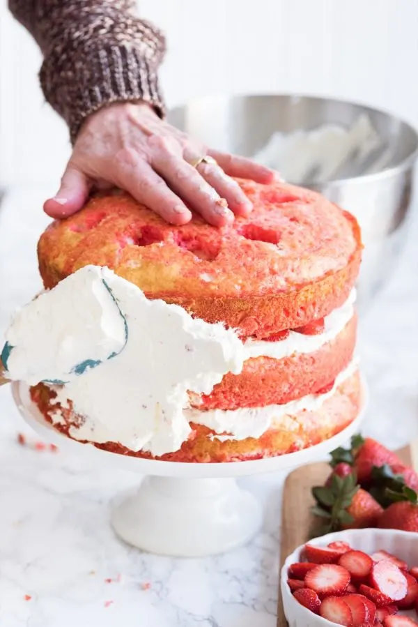 Strawberry Poke Cake with Berries + Cream | Birthday cake recipes, poke cake recipes, party appetizers, entertaining tips, birthday party ideas and more from @cydconverse