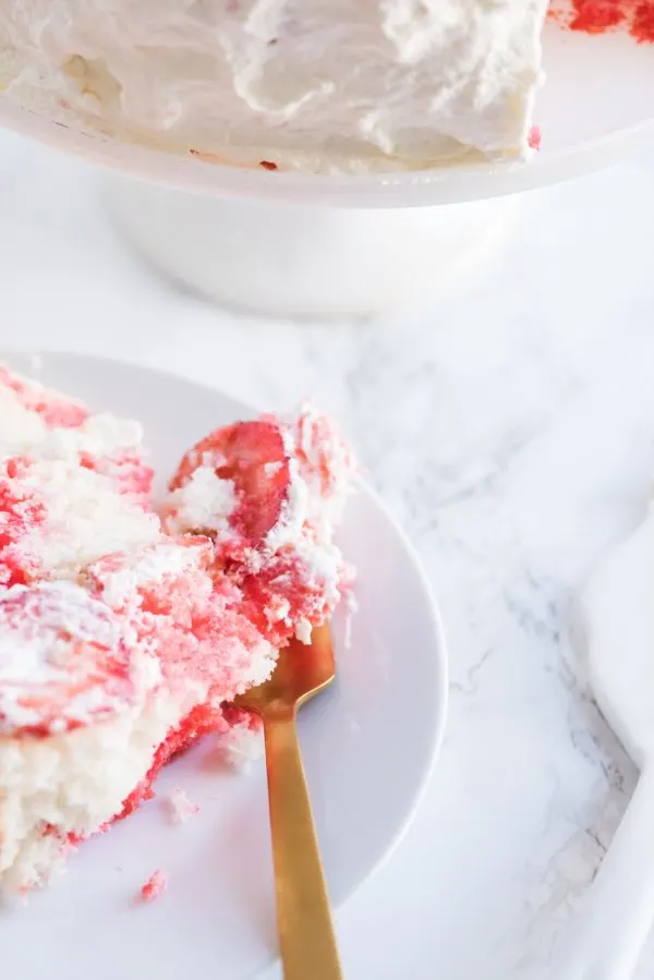 Strawberry Poke Cake with Berries + Cream | Birthday cake recipes, poke cake recipes, party appetizers, entertaining tips, birthday party ideas and more from @cydconverse