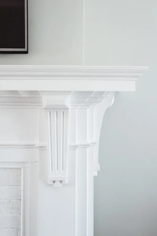 A Budget-Friendly DIY Fireplace Makeover for Under $30 | Easy home reno projects, fireplace ideas, tips for how to paint a fireplace and how to paint brick from @cydconverse