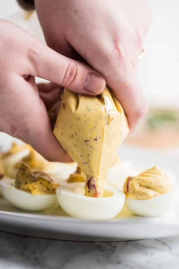 Best Deviled Eggs Recipe | Easter recipes, party appetizers, entertaining tips and party ideas from @cydconverse