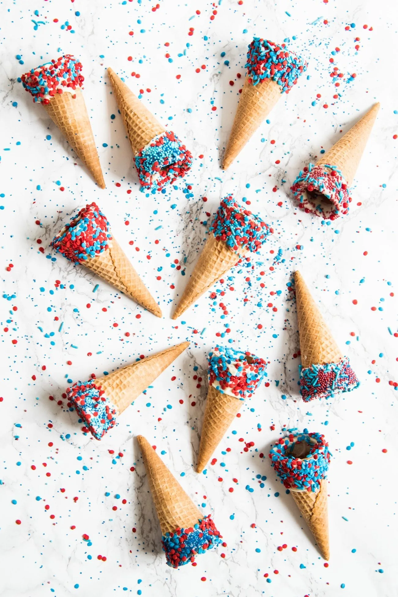 4th of July Desserts: Sprinkle Dipped Ice Cream Cones | Follow @cydconverse for more entertaining ideas, recipes, cocktail recipes, party themes and more!