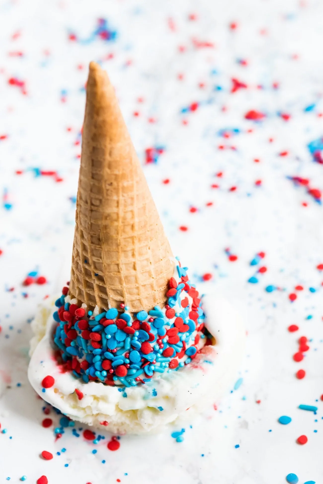4th of July Desserts: Sprinkle Dipped Ice Cream Cones | Follow @cydconverse for more entertaining ideas, recipes, cocktail recipes, party themes and more!