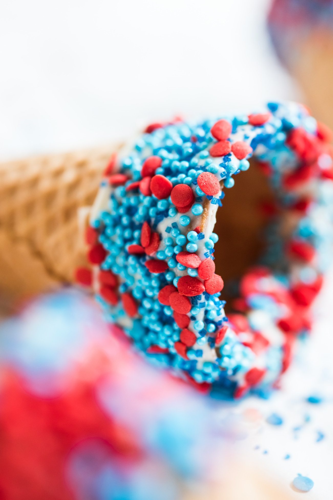 4th of July Desserts: Sprinkle Dipped Ice Cream Cones | Follow @cydconverse for more entertaining ideas, recipes, cocktail recipes, party themes and more!
