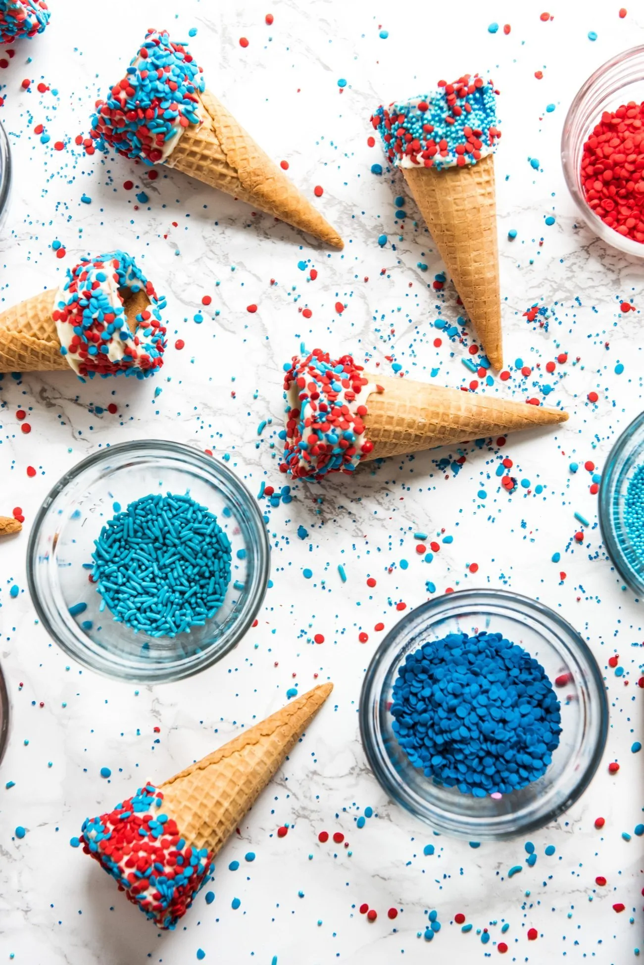 4th of July Desserts: Sprinkle Dipped Ice Cream Cones | Follow @cydconverse for more entertaining ideas, recipes, cocktail recipes, party themes and more!