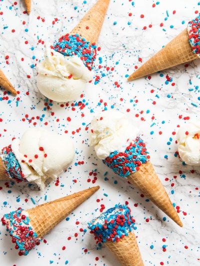 Sprinkle Dipped Red, White + Blue 4th of July Ice Cream Cones thumbnail