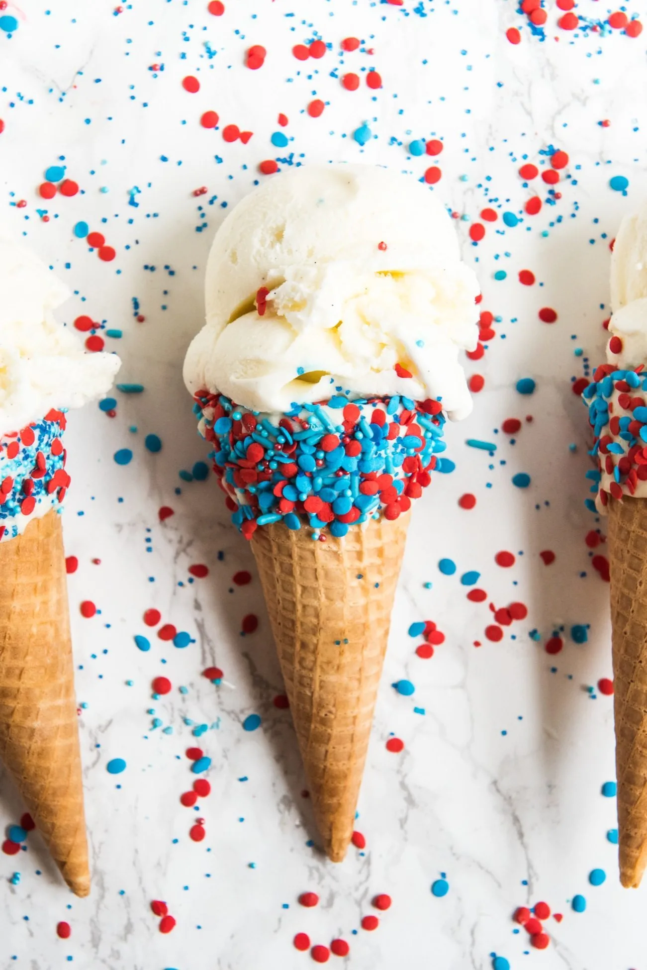 4th of July Desserts: Sprinkle Dipped Ice Cream Cones | Follow @cydconverse for more entertaining ideas, recipes, cocktail recipes, party themes and more!