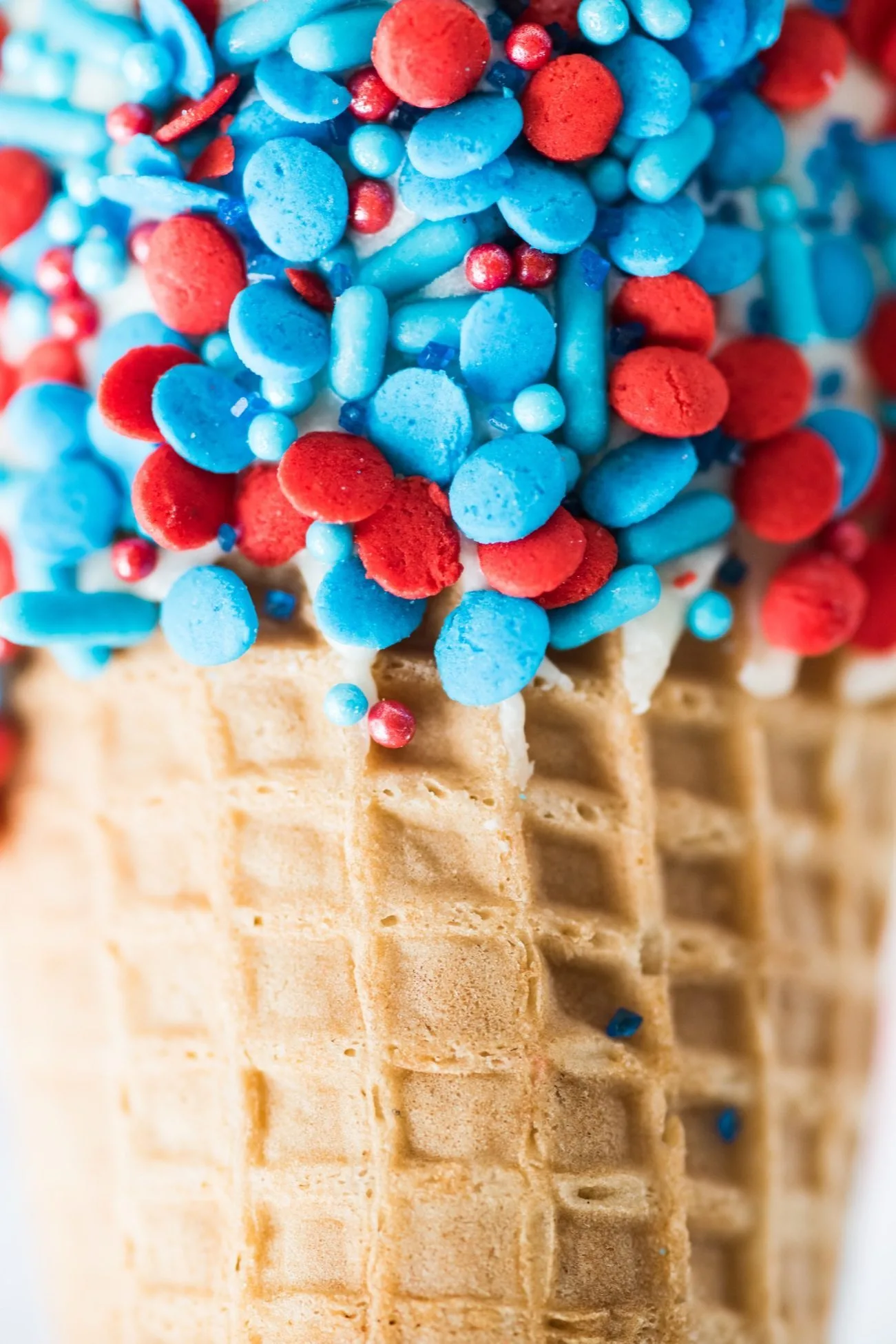 4th of July Desserts: Sprinkle Dipped Ice Cream Cones | Follow @cydconverse for more entertaining ideas, recipes, cocktail recipes, party themes and more!