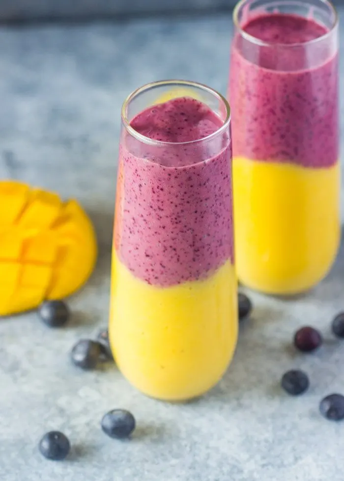 Layered Blueberry Mango Smoothie Recipe | 12 Summer Smoothies plus loads of party recipes, entertaining tips, cocktail recipes and more from @cydconverse