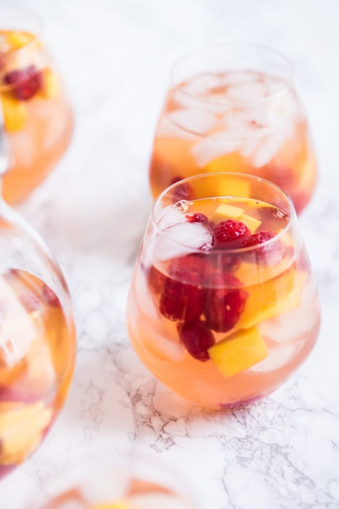 Sparkling Summer Solstice Sangria Recipe | Entertaining tips, cocktail recipes, party ideas, summer solstice ideas and more from @cydconverse