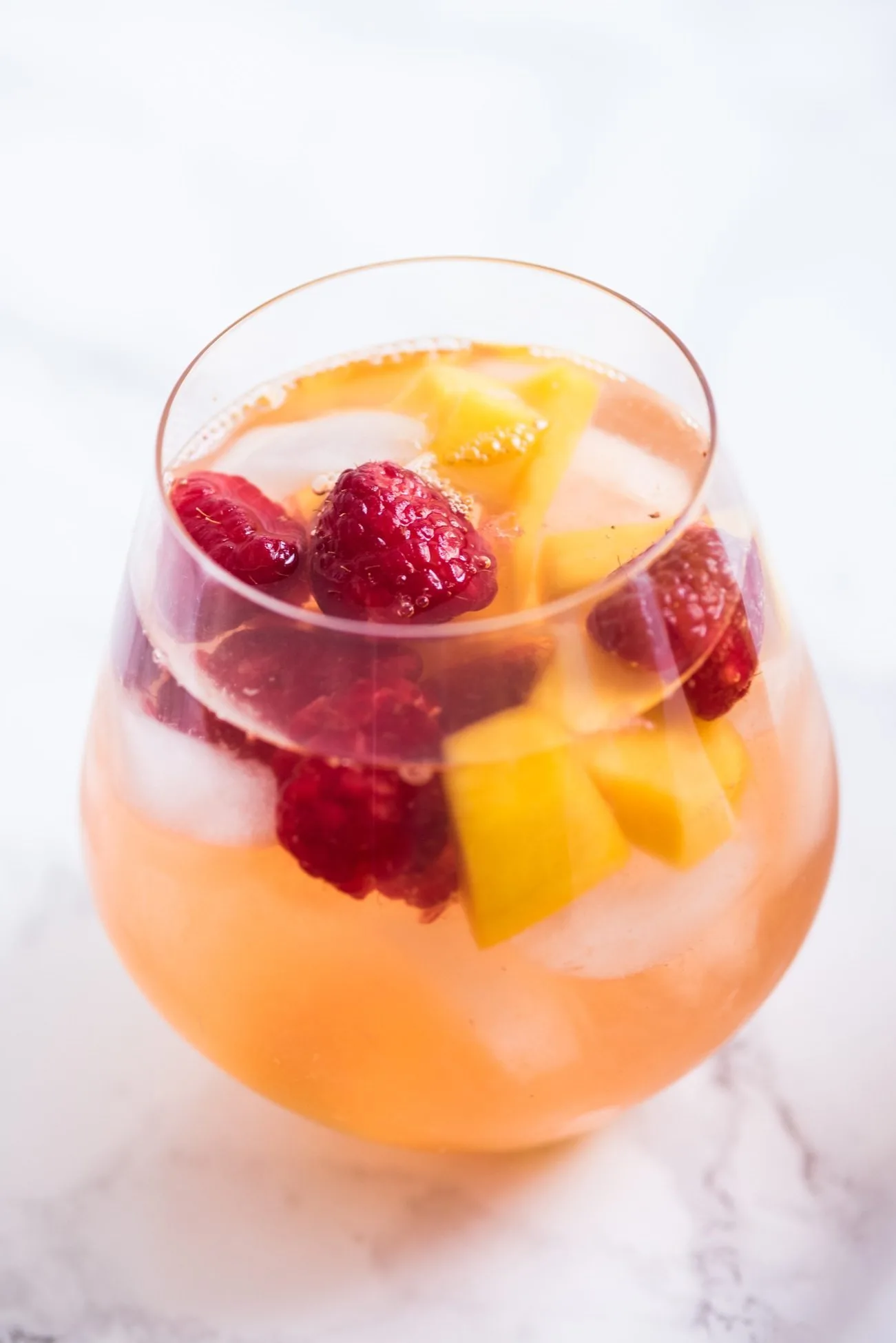 Sparkling Summer Solstice Sangria Recipe | Entertaining tips, cocktail recipes, party ideas, summer solstice ideas and more from @cydconverse