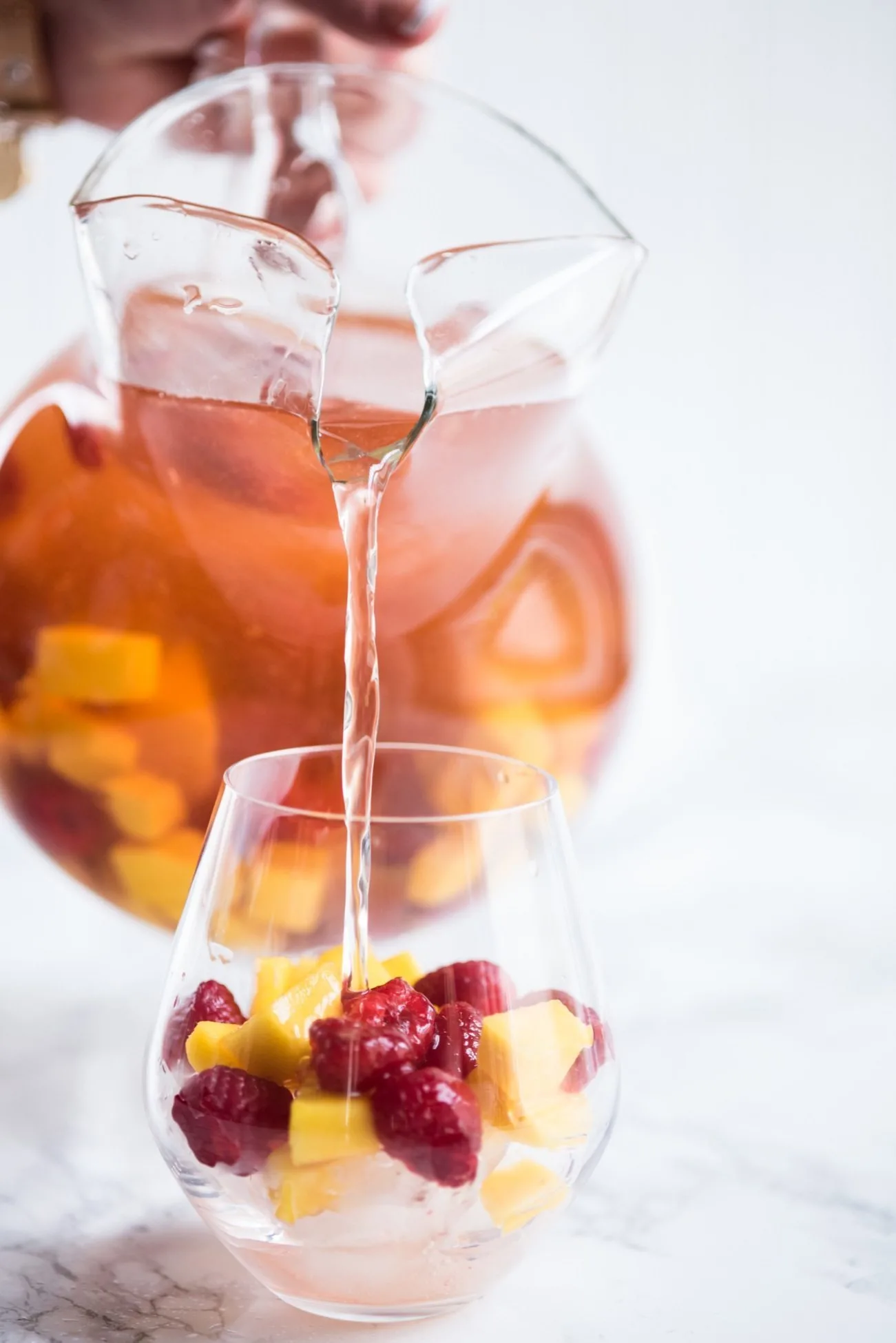 Sparkling Summer Solstice Sangria Recipe | Entertaining tips, cocktail recipes, party ideas, summer solstice ideas and more from @cydconverse