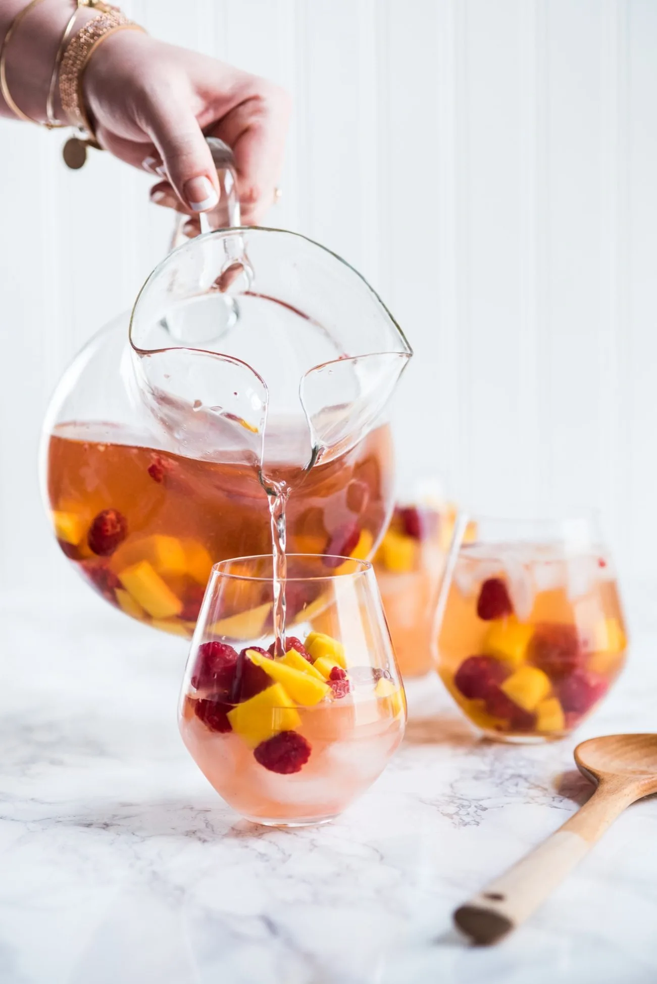 Sparkling Summer Solstice Sangria Recipe | Entertaining tips, cocktail recipes, party ideas, summer solstice ideas and more from @cydconverse