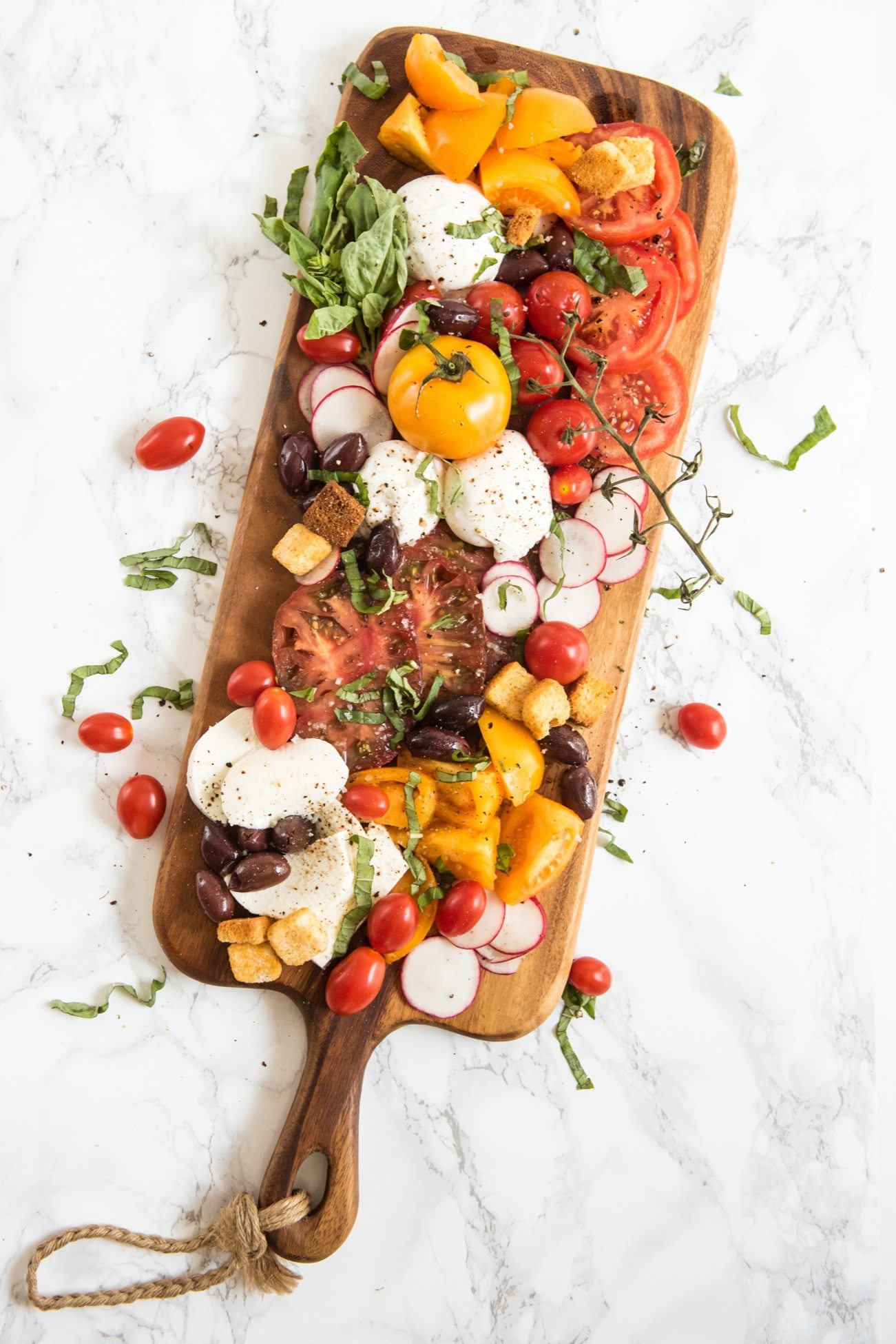 The Ultimate Caprese Salad Board | Entertaining ideas, party appetizers, cocktail recipes, party ideas and more from @cydconverse