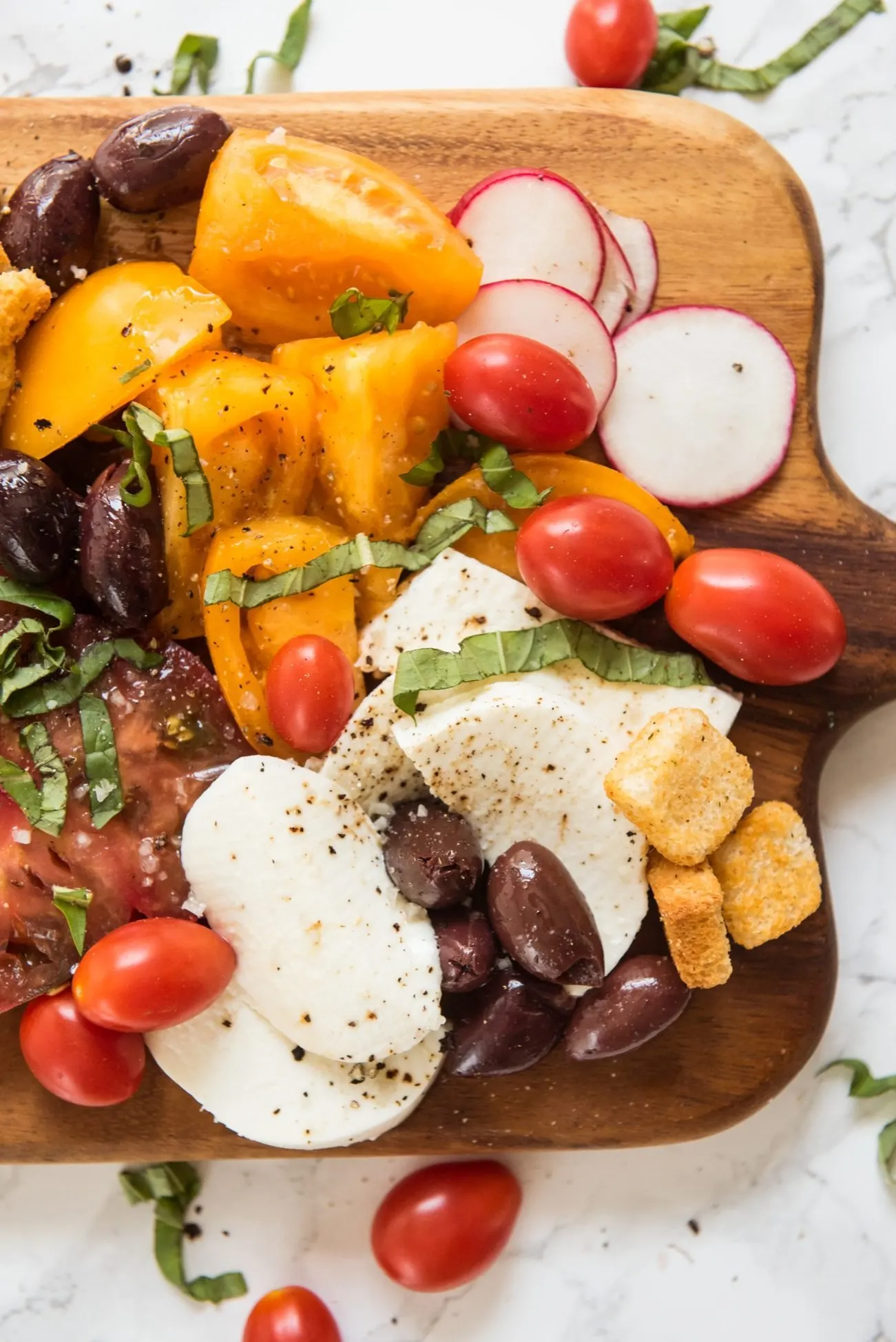 The Ultimate Caprese Salad Board | Entertaining ideas, party appetizers, cocktail recipes, party ideas and more from @cydconverse