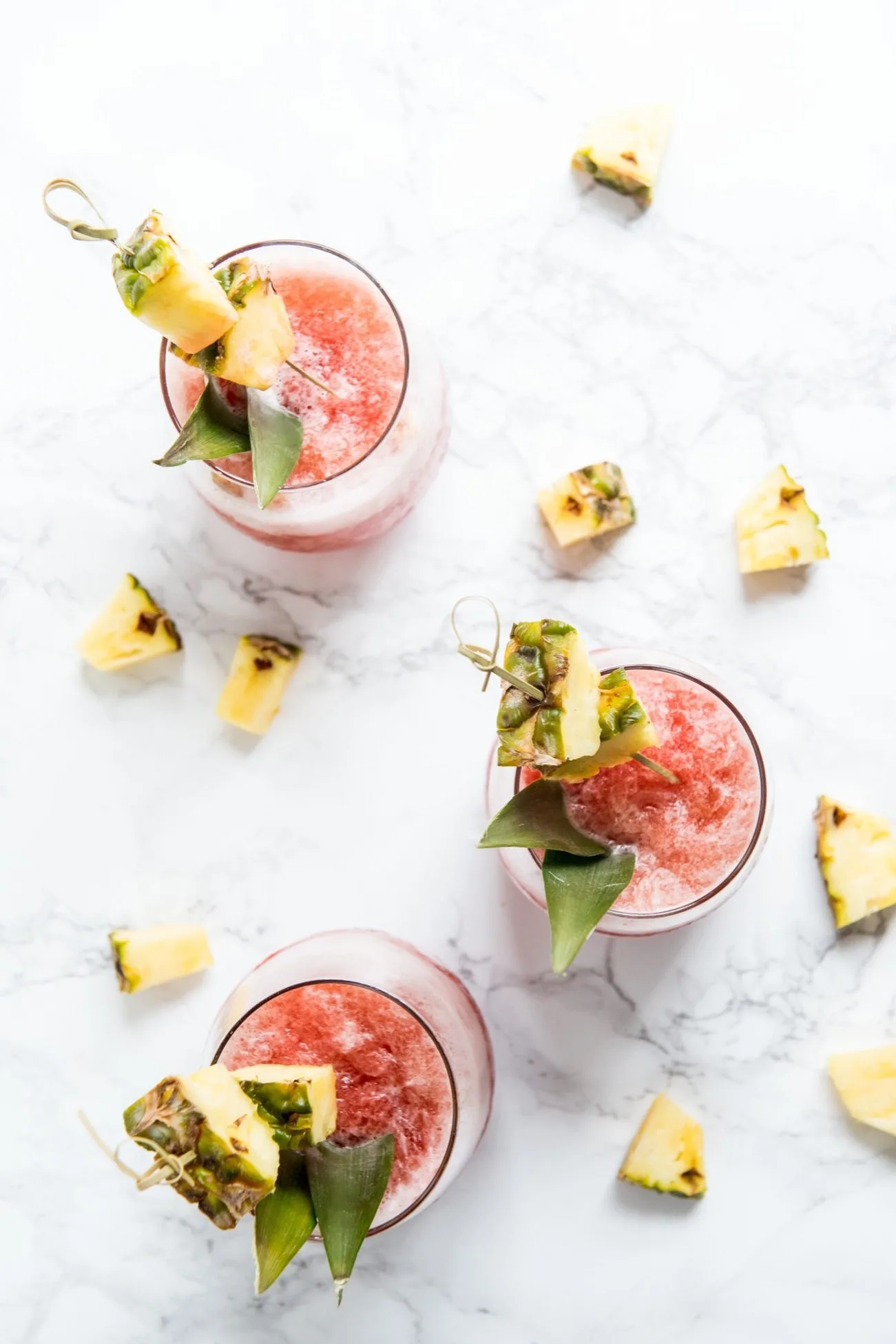 Coconut Pineapple Rum Slush Tropical Cocktail Recipe | Tropical cocktails, cocktail recipes, party ideas, entertaining tips and more from @cydconverse
