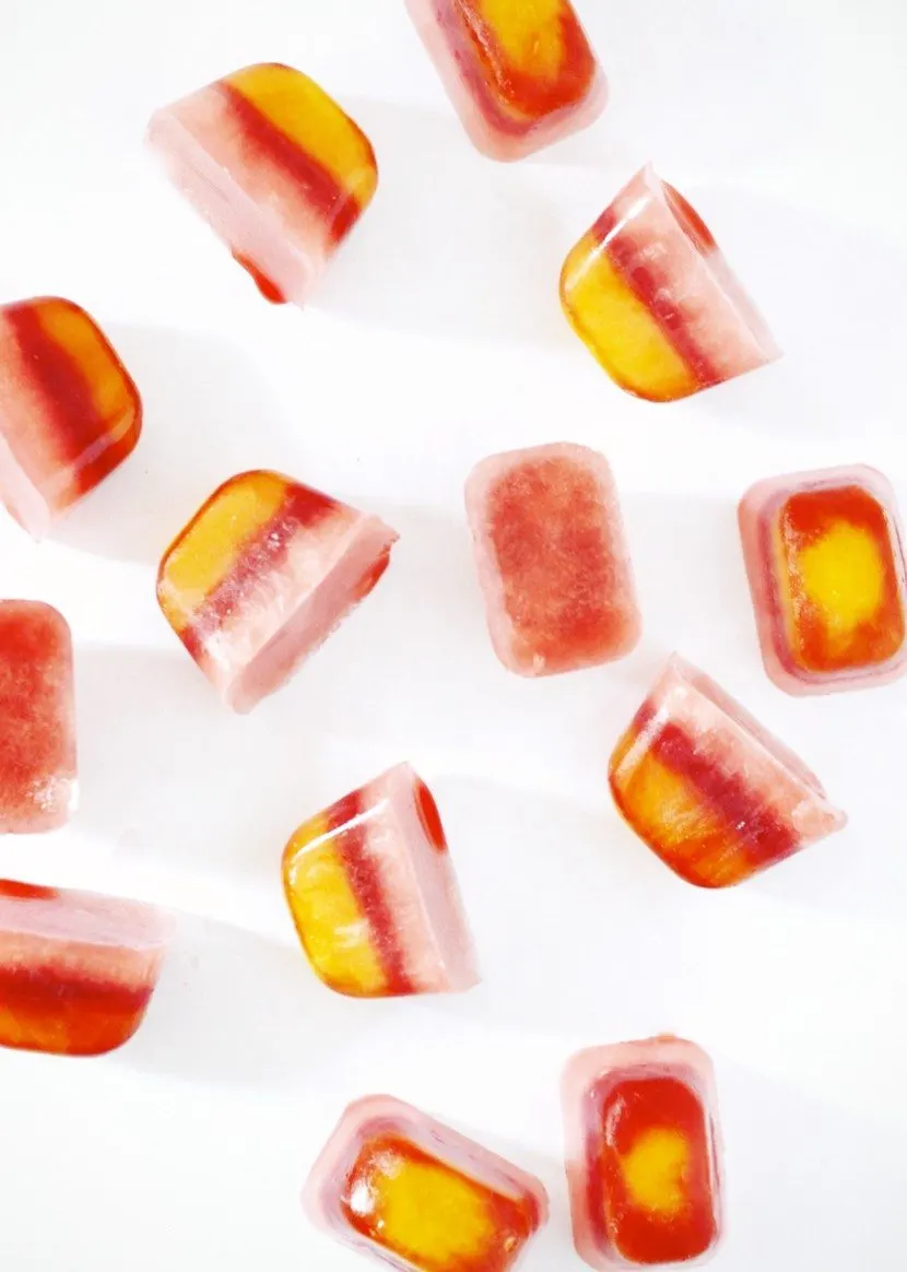 Boozy Striped Ice Cubes | Summer entertaining, summer party ideas and more from @cydconverse
